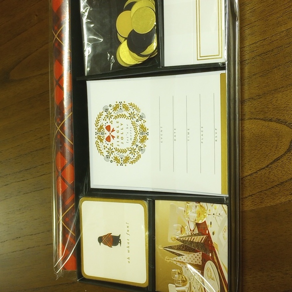 Holiday party tablescapes and invitations set.